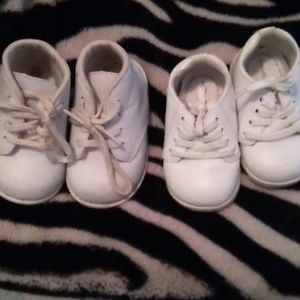 Two pairs of baby shoes (one is size 3 wide and one is size 4 wide)